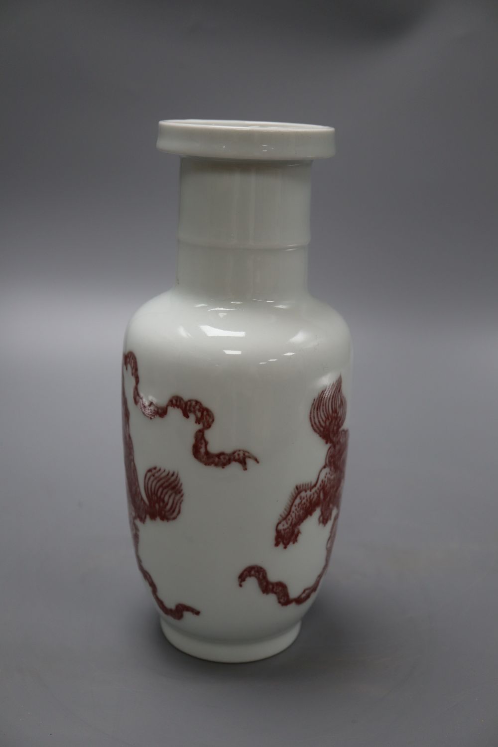 A Chinese underglaze copper red rouleau vase, height 24cm
